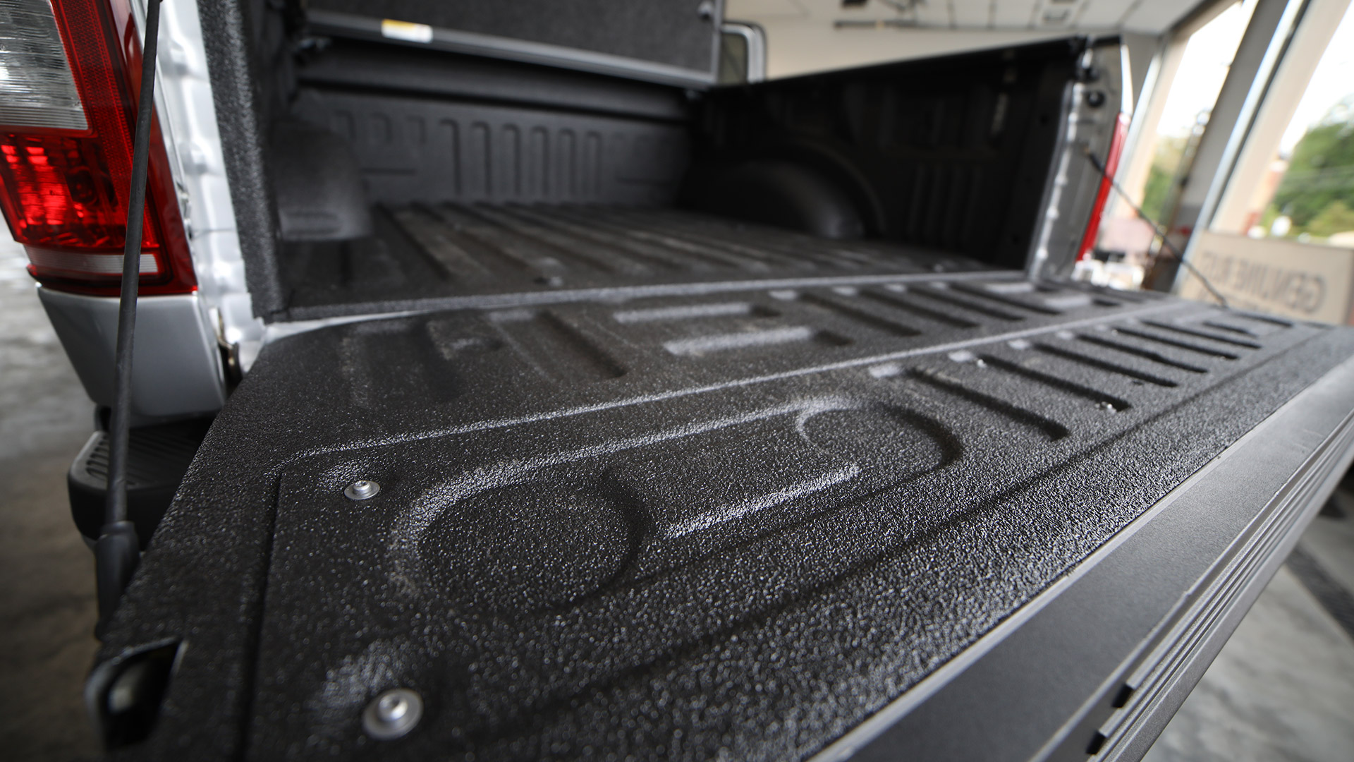 Truck bed with spray-on bedliner